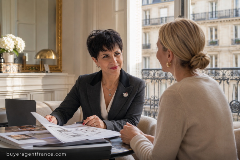 International buyer reviewing French property purchase documents with notaire in Paris