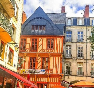 International buyer exploring property opportunities in Nantes with guidance from an English-speaking real estate agent.